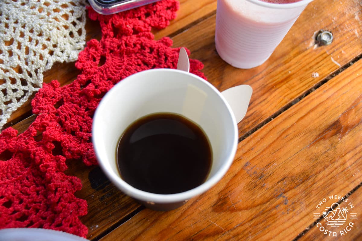 a cup of coffee on a rustic wooden table