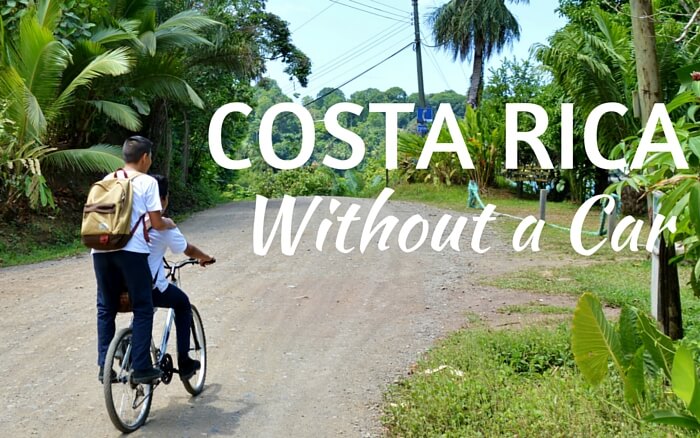 two people riding a bicycle with the text overlay that reads Costa Rica Without a Car