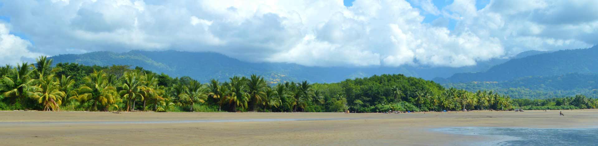 Costa Rica Beach with Mountains and Clouds