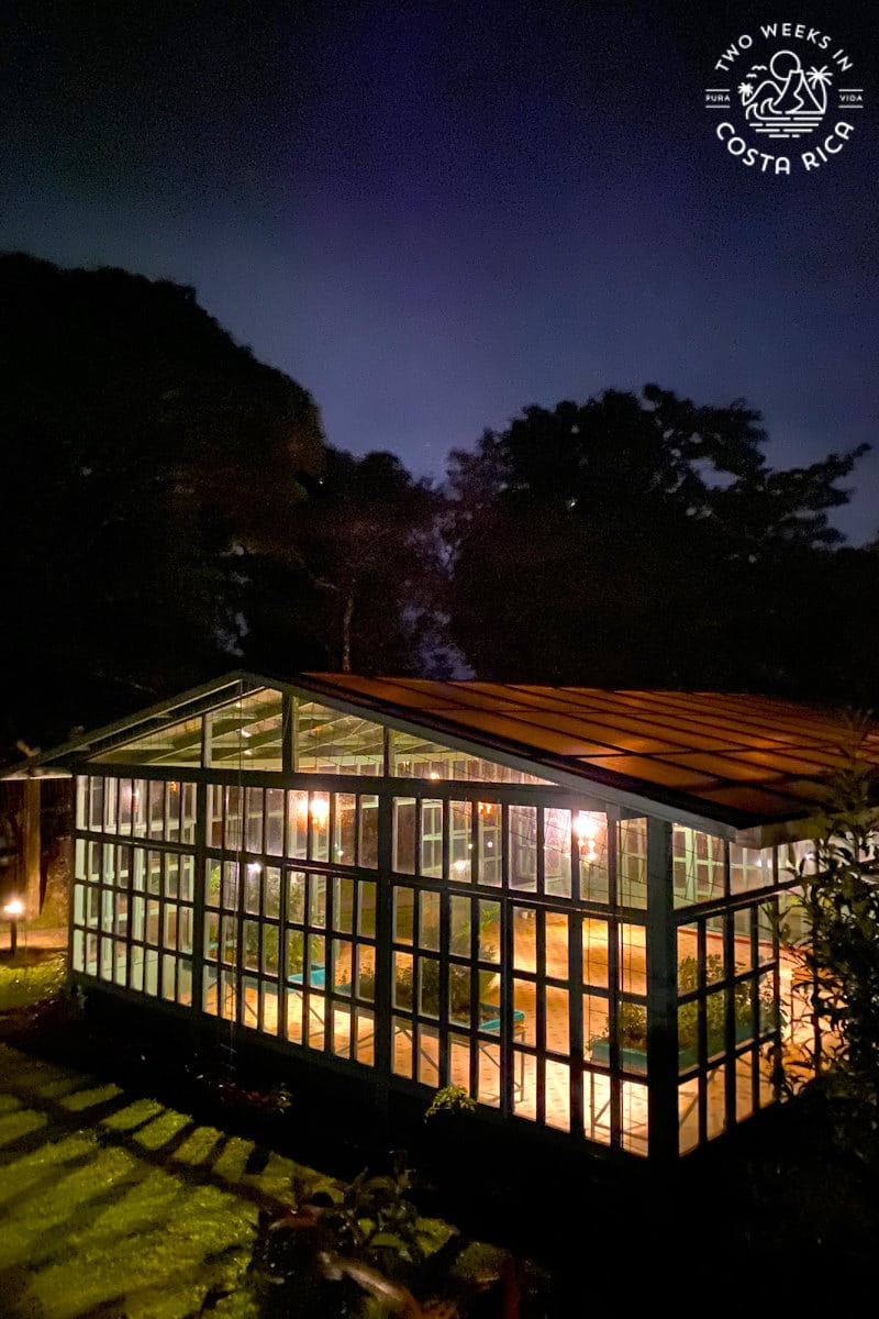 building lit up at night at cloud forest lodge