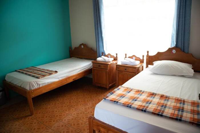 two twin beds in a simple room