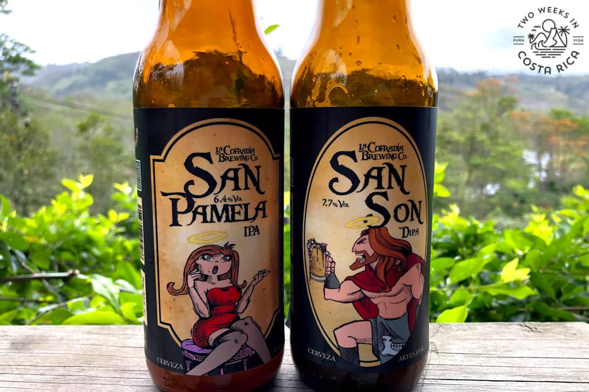 Two beer bottles with cartoon-like characters on the labels, one man and one woman