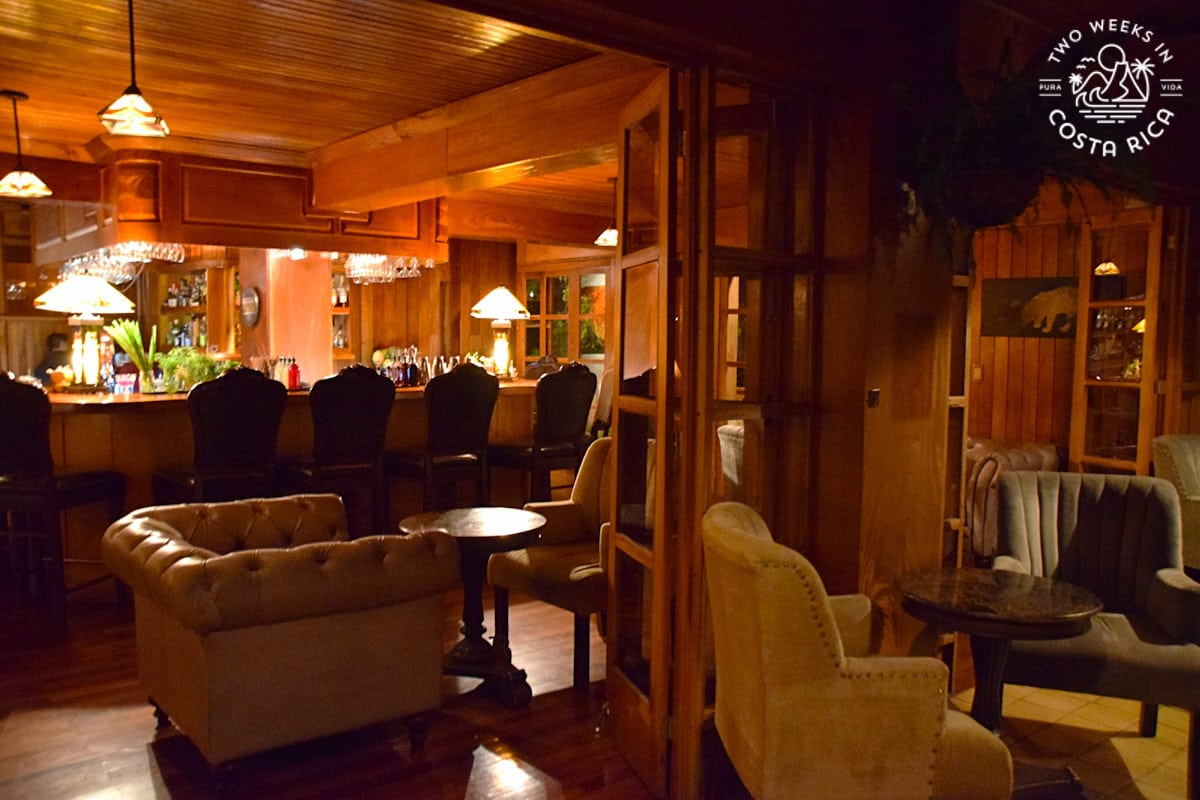 a dimly lit lounge at belmar hotel