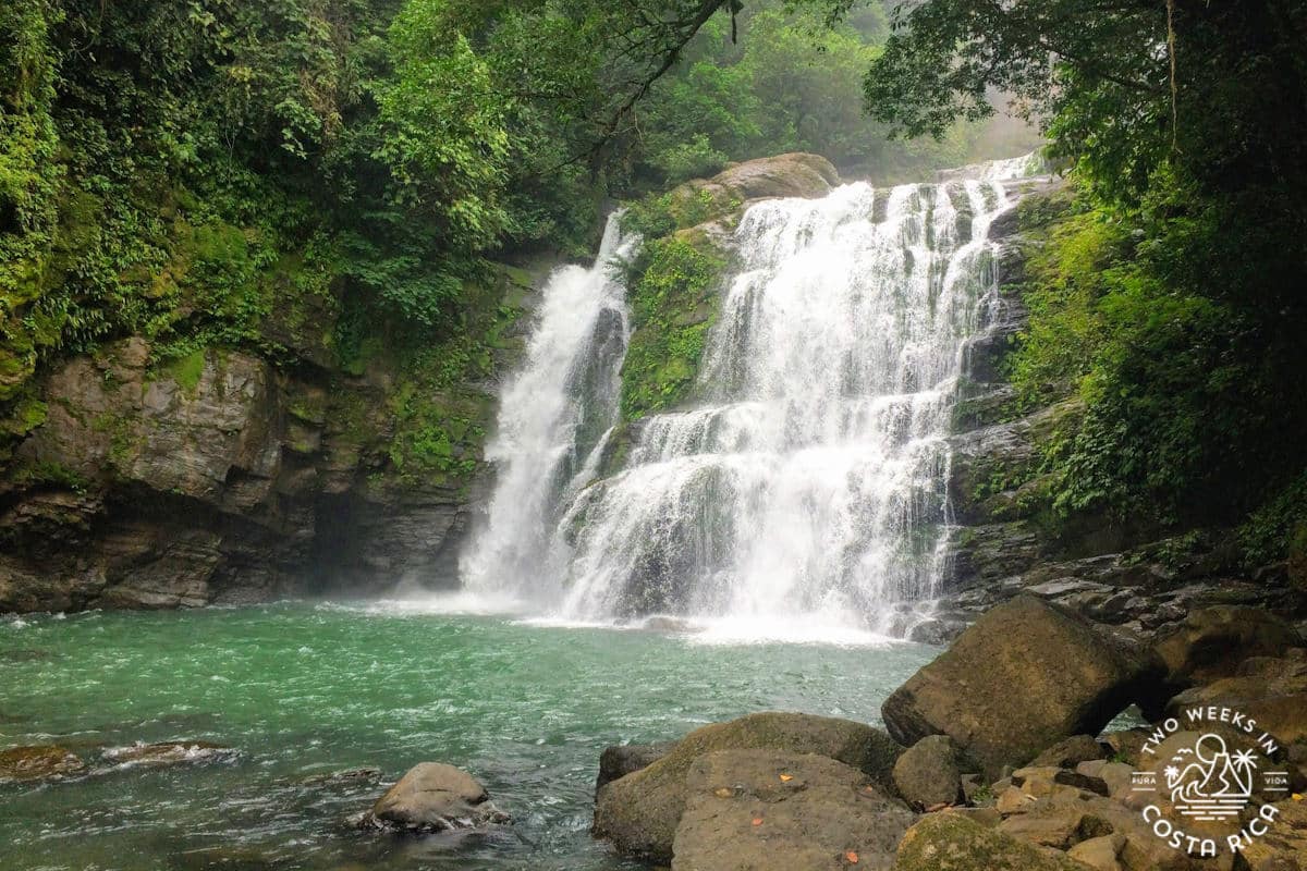 nauyaca waterfall with emerald green water