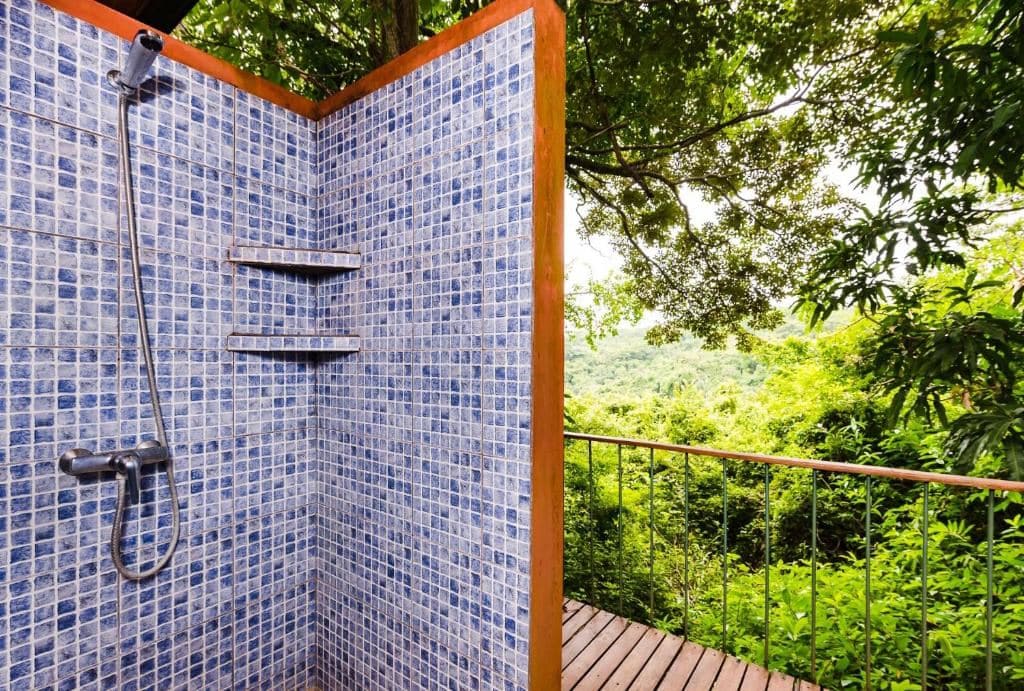 outdoor shower in forest at hotel luna azul