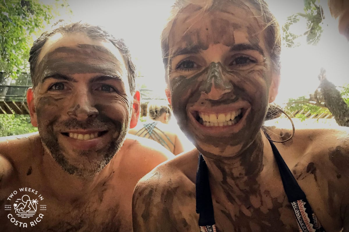 two people with mud on their faces in costa rica