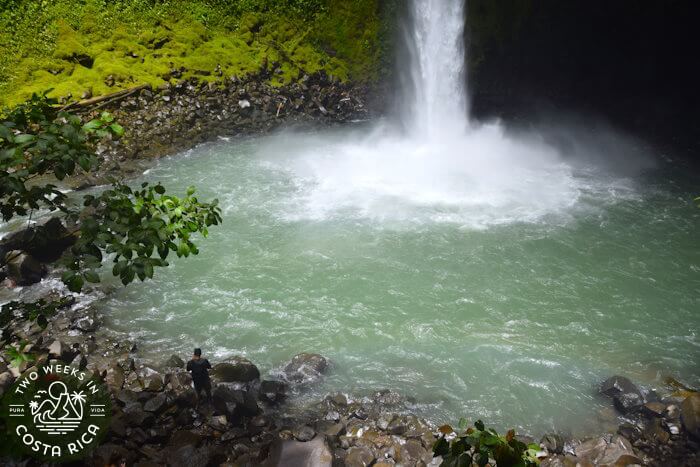 Turbulent pool with rocks along edge