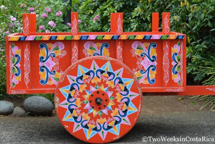A brightly colored oxcart outside Fábrica de Carretas Eloy Alfaroof in Sarchi