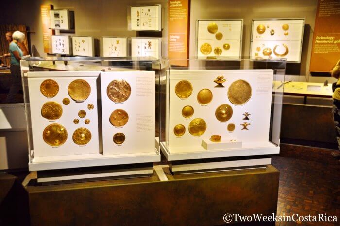 Gold artifacts in display cases at the Pre-Columbian Gold Museum in Costa Rica