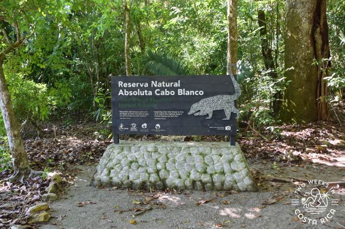 a sign that reads Reserva Natural Absoluta Cabo Blanco