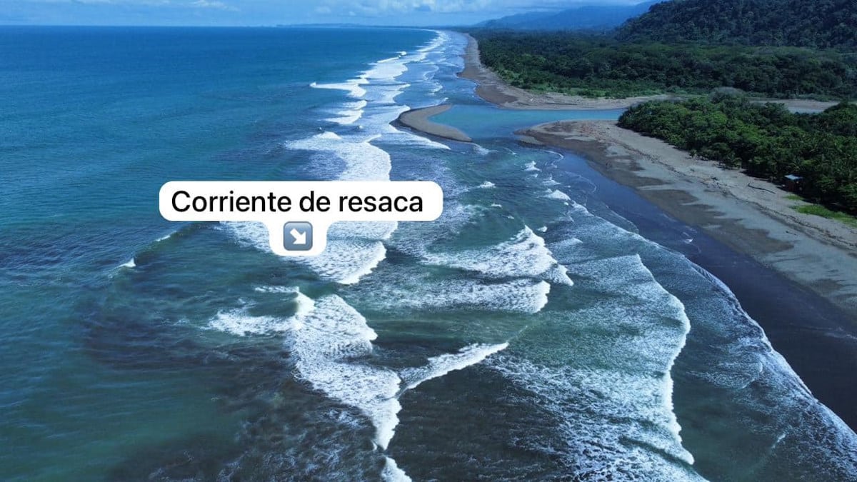aerial photo of the beach in dominical costa rica with a rip current