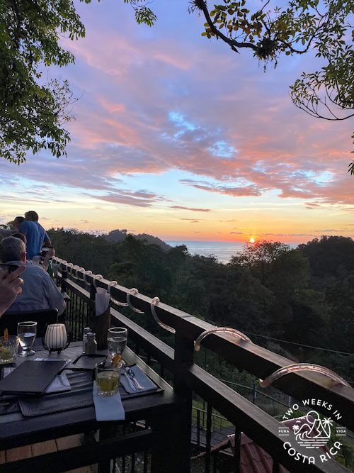 restaurant patio with pink and orange sunset