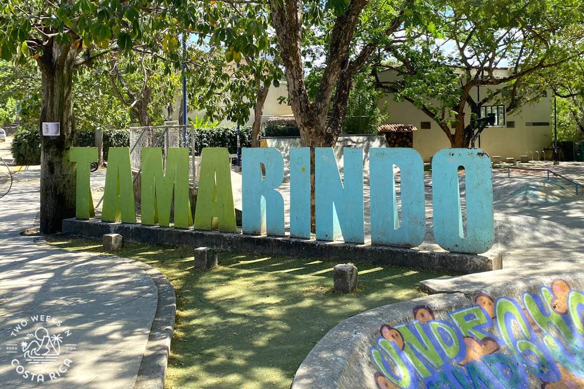 block letter statue in a park that says Tamarindo