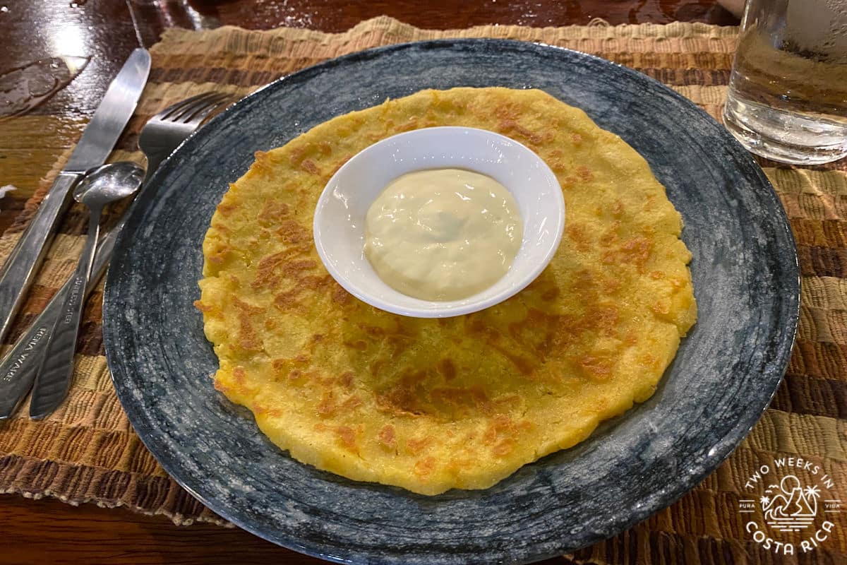 tortilla on a plate with sour cream